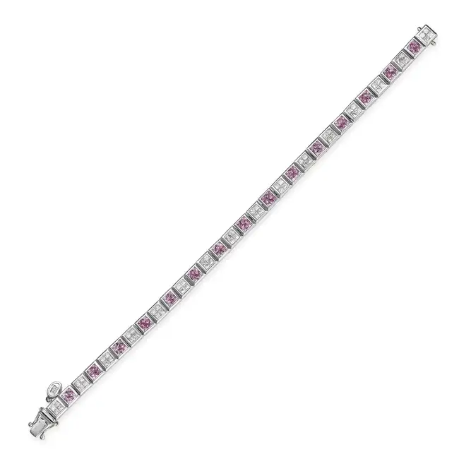 A PINK SAPPHIRE AND DIAMOND BRACELET in 18ct white gold, comprising square links set alternately