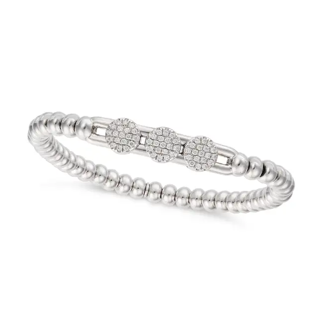 HULCHI BELLUNI, A DIAMOND MOVEABLE BRACELET in 18ct white gold, comprising three moveable clusters