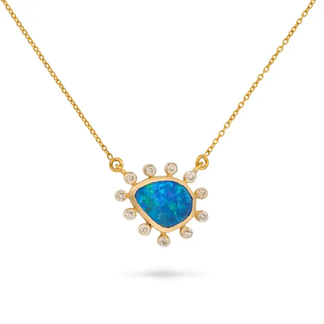 AN OPAL DOUBLET AND DIAMOND PENDANT NECKLACE the pendant set with an opal doublet accented by