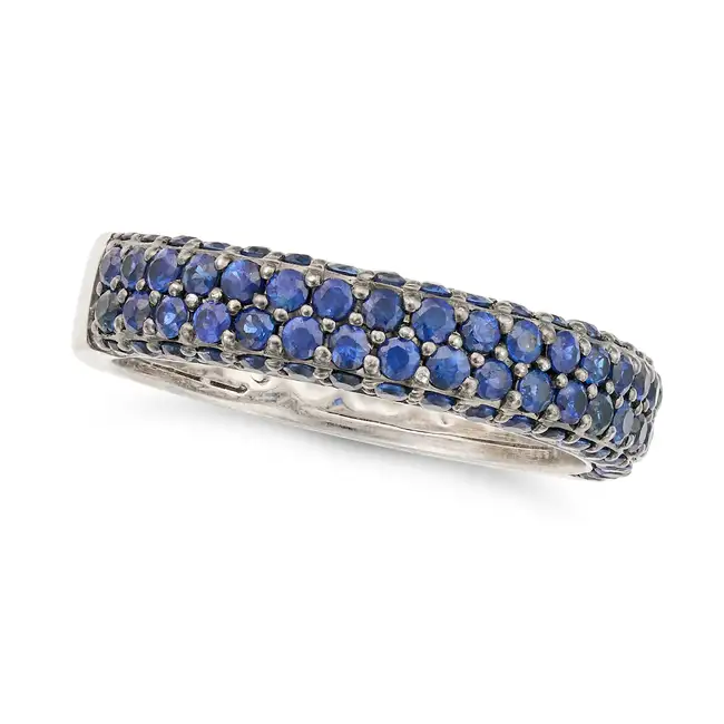 A SAPPHIRE BAND RING half set with pave set round cut sapphires, no assay marks, size M / 6.25, 4.