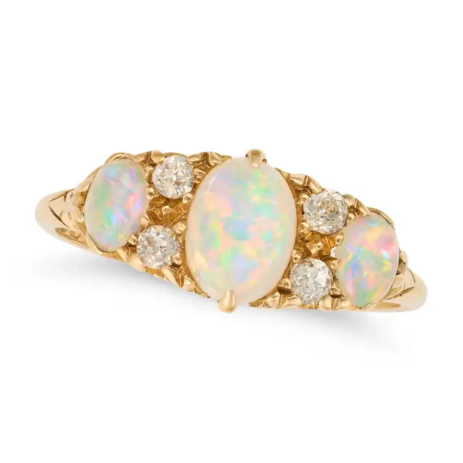 A FINE ANTIQUE EDWARDIAN OPAL AND DIAMOND RING, 1906 in 18ct yellow gold, set with three oval