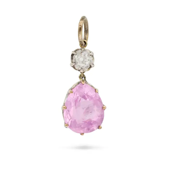 A PINK SAPPHIRE AND DIAMOND PENDANT comprising a pear cut pink sapphire of approximately 2.05