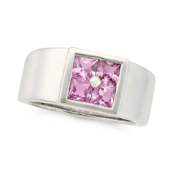 HERMES, A PINK SAPPHIRE DRESS RING in 18ct white gold, set with four French cut pink sapphires,