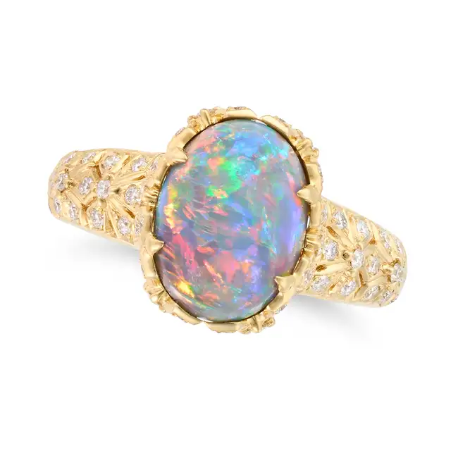 KAT FLORENCE, A FINE BLACK OPAL AND DIAMOND DRESS RING set with an oval cabochon black opal of 3.
