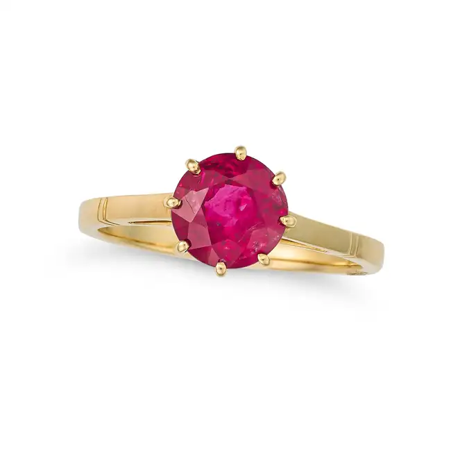 FRED LEIGHTON, A BURMA RUBY RING set with a round cut ruby of approximately 1.25 carats, signed Fred
