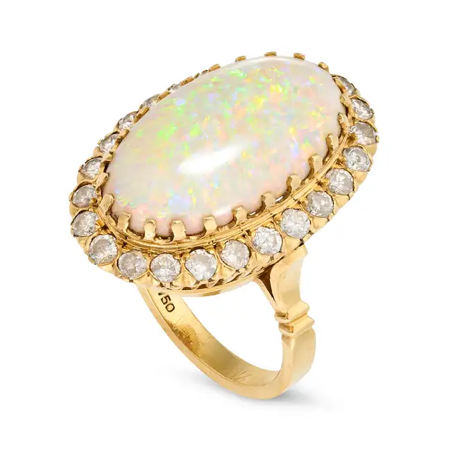 NO RESERVE - A VINTAGE OPAL AND DIAMOND COCKTAIL RING in 18ct yellow gold, set with a large oval