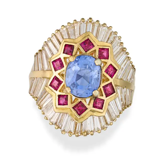 A FRENCH SAPPHIRE, RUBY AND DIAMOND DRESS RING in 18ct yellow gold, set with an oval cut sapphire of