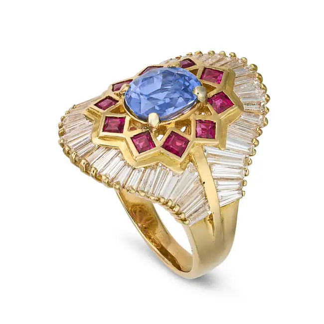 A FRENCH SAPPHIRE, RUBY AND DIAMOND DRESS RING in 18ct yellow gold, set with an oval cut sapphire of