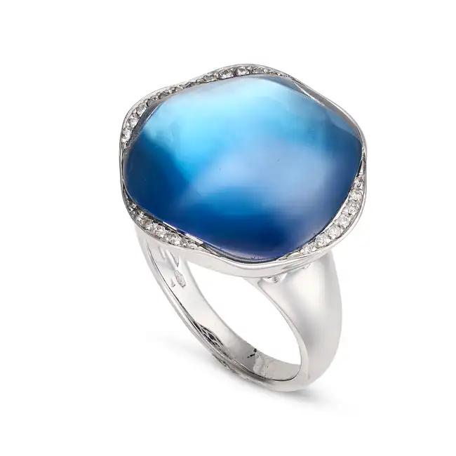 MORAGLIONE, A BLUE TOPAZ, MOTHER OF PEARL, LAPIS LAZULI AND DIAMOND DRESS RING in 18ct white gold,