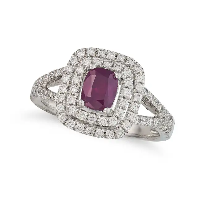 OSCAR FRIEDMAN, A PURPLE KASHMIR SAPPHIRE AND DIAMOND RING set with a cushion cut purple sapphire of