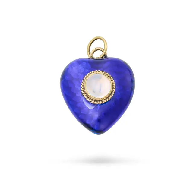 AN ANTIQUE MOONSTONE AND ENAMEL HEART PENDANT in yellow gold, designed as a heart, the body relieved