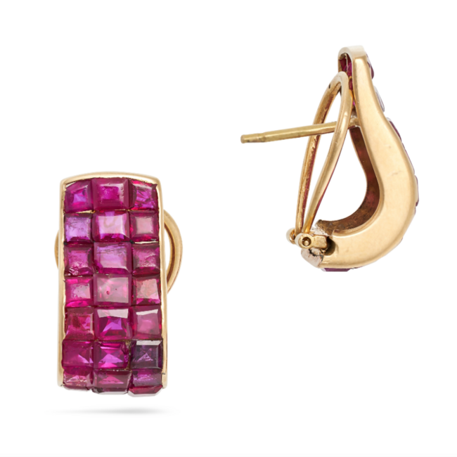 A PAIR OF RUBY HOOP EARRINGS in 18ct yellow gold, each designed as a half hoop invisibly set with square step cut rubies, the rubies all totalling 6.5-7.0 carats, French import marks, 2.2cm, 8.4g. 