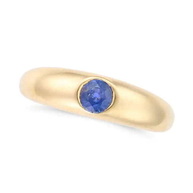 A SAPPHIRE RING set with a round cut sapphire of 0.55 carats, inscribed 0.55CT, stamped 14K, size