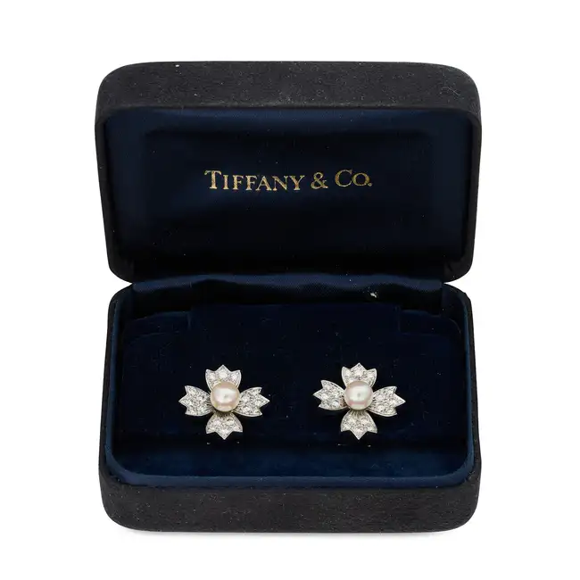 TIFFANY & CO., A PAIR OF PEARL AND DIAMOND FLOWER EARRINGS, 1994 each designed as a flower set