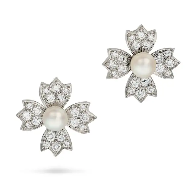 TIFFANY & CO., A PAIR OF PEARL AND DIAMOND FLOWER EARRINGS, 1994 each designed as a flower set