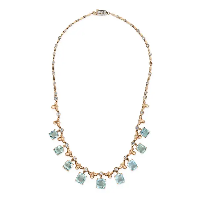 A VINTAGE AQUAMARINE AND WHITE SAPPHIRE NECKLACE comprising a row of fancy links set with round