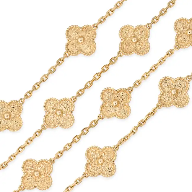 VAN CLEEF & ARPELS, A TWENTY MOTIF GOLD ALHAMBRA NECKLACE in 18ct yellow gold, comprising twenty