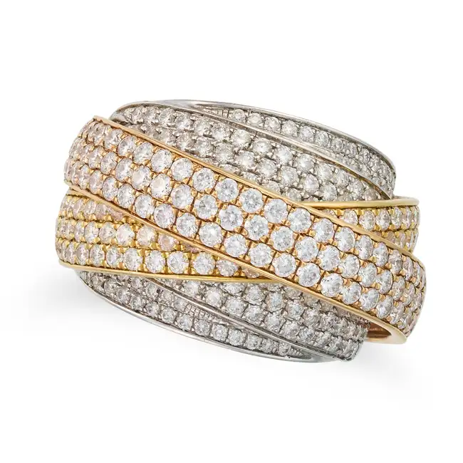A DIAMOND TRI-COLOUR GOLD DRESS RING in 18ct tri-colour gold, the stylised ring comprising