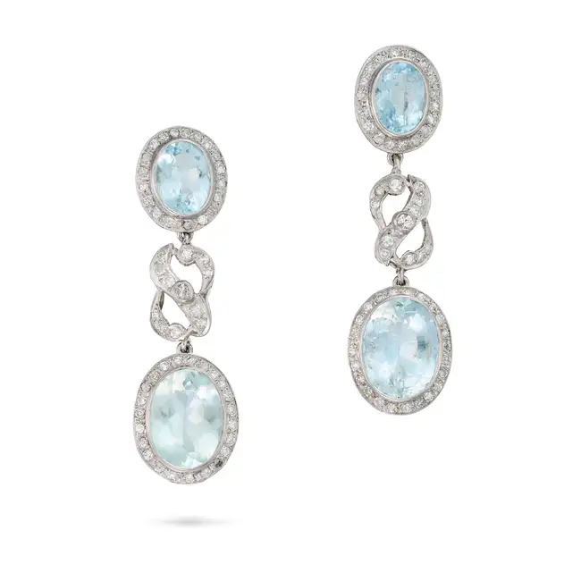 A PAIR OF AQUAMARINE AND DIAMOND DROP EARRINGS each set with an oval cut aquamarine in a border of