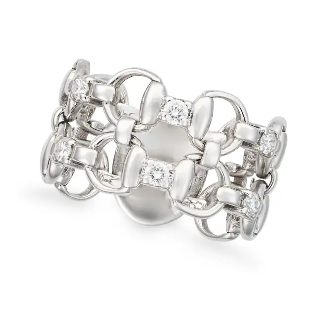 GUCCI, A DIAMOND HORSE BIT RING in 18ct white gold, designed as two rows of horse bit motifs, set