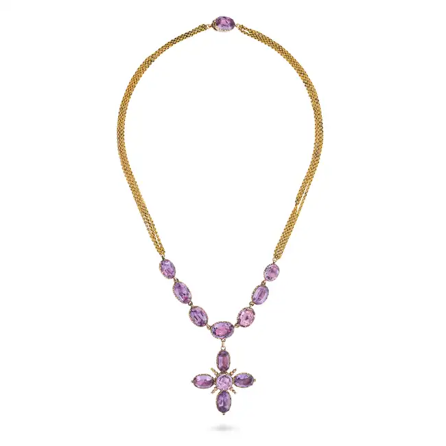 A FINE ANTIQUE AMETHYST NECKLACE, CIRCA 1870 in yellow gold, the pendant designed as a cross set