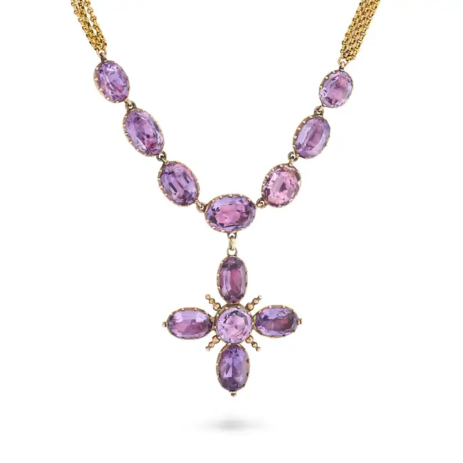 A FINE ANTIQUE AMETHYST NECKLACE, CIRCA 1870 in yellow gold, the pendant designed as a cross set