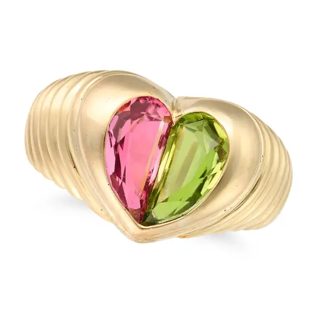 BULGARI, A PINK TOURMALINE AND PERIDOT DOPPIO TONDO RING comprising a heart motif set with a fancy