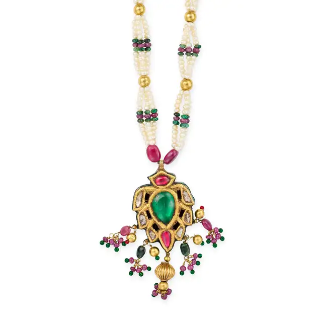 AN INDIAN RUBY, DIAMOND, EMERALD AND PEARL NECKLACE the pendant set to the centre with a green paste