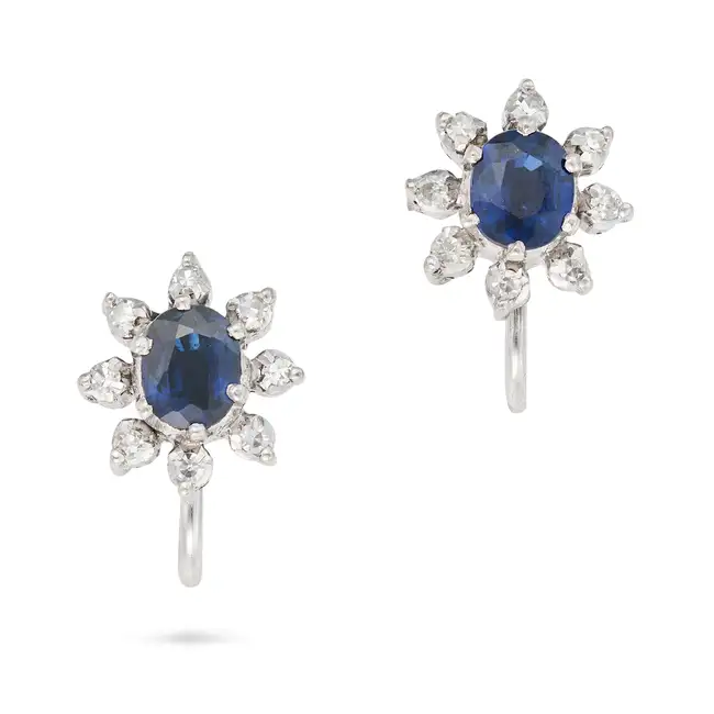 A PAIR OF VINTAGE SAPPHIRE AND DIAMOND CLUSTER EARRINGS in 18ct white gold, each set with an oval