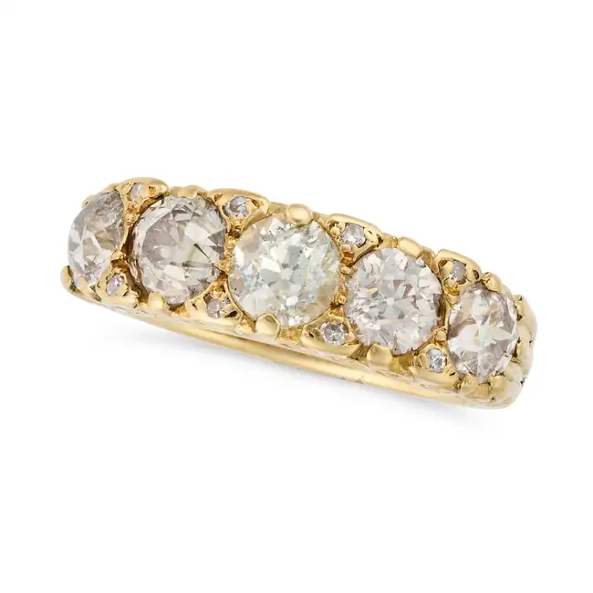 AN ANTIQUE DIAMOND FIVE STONE RING in yellow gold, set with five old European cut diamonds, accented