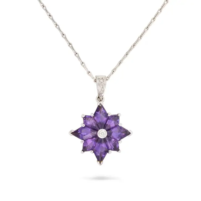 NO RESERVE - AN AMETHYST AND DIAMOND PENDANT AND CHAIN in 18ct white gold, the pendant designed as a
