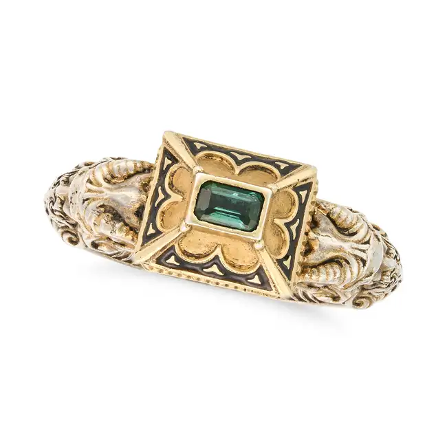​A RENAISSANCE REVIVAL RING ​the ornate ring set with a step cut green tourmaline and accented by