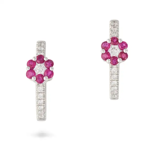 NO RESERVE - A PAIR OF RUBY AND DIAMOND FLOWER HOOP EARRINGS in 18ct white gold, each designed as