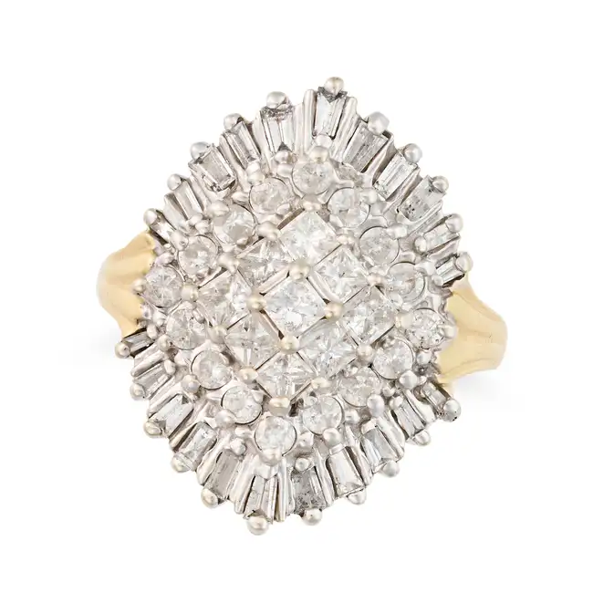 A DIAMOND DRESS RING set with a cluster of princess, round brilliant and tapered baguette cut
