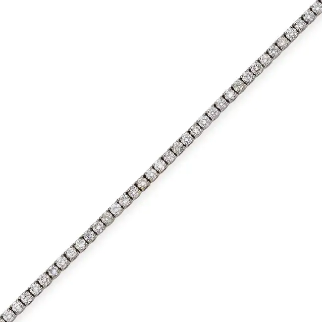 A DIAMOND LINE BRACELET comprising a row of round brilliant cut diamonds totalling 3.0-3.2 carats,