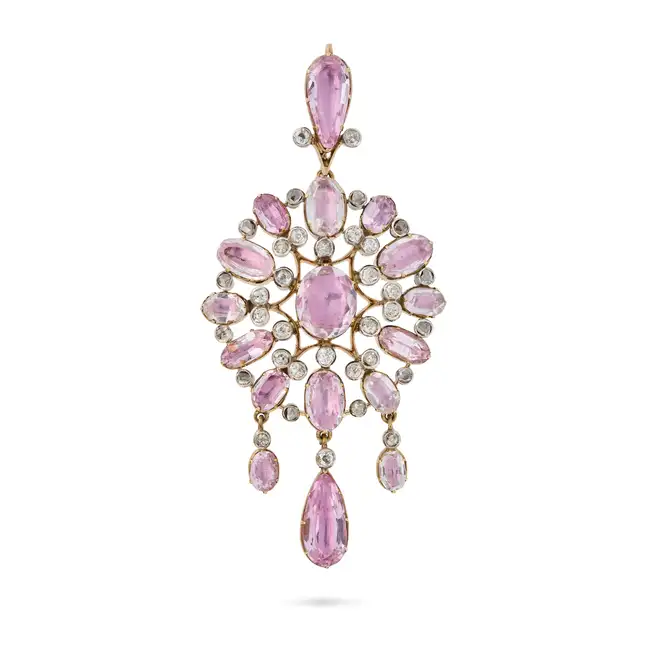 A FINE ANTIQUE NATURAL PINK TOPAZ AND DIAMOND PENDANT the openwork pendant set with oval cut pink