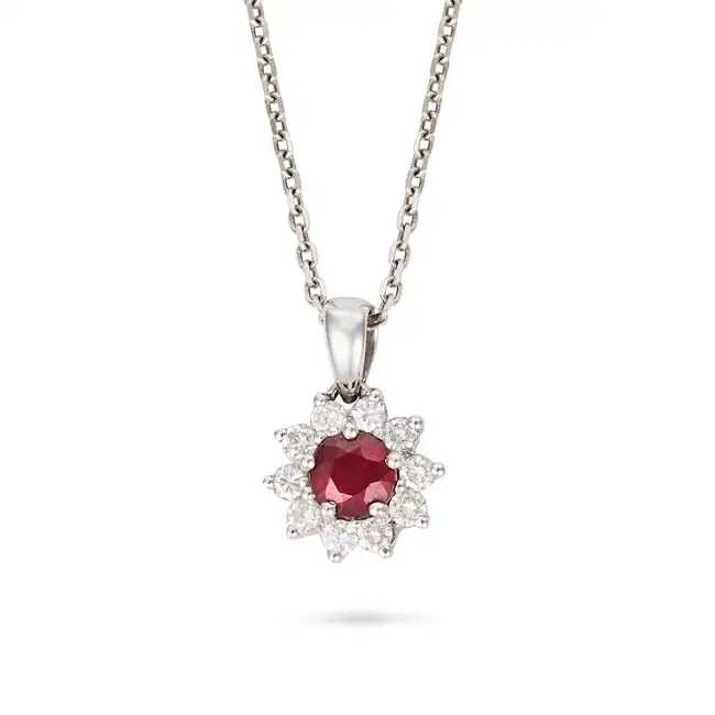 A RUBY AND DIAMOND PENDANT NECKLACE the pendant set with a round cut ruby of approximately 0.35