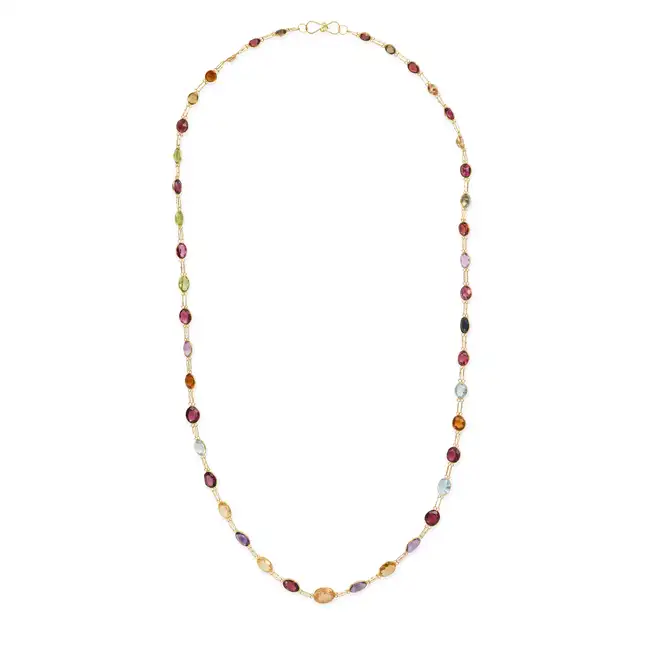A MULTI GEM CHAIN NECKLACE comprising a single row of oval cut citrines, amethysts, garnets, blue