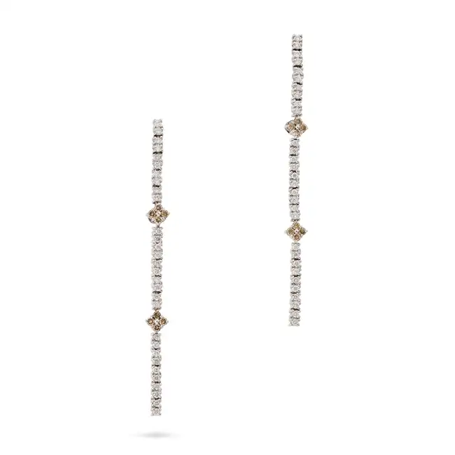 A PAIR OF DIAMOND DROP EARRINGS in 18ct white gold, each suspending a row of round brilliant cut