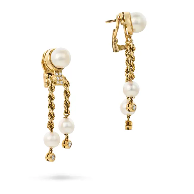 BOUCHERON, A PAIR OF VINTAGE PEARL AND DIAMOND DROP EARRINGS,1970's in 18ct yellow gold, each set