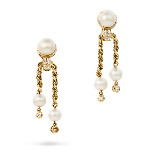 BOUCHERON, A PAIR OF VINTAGE PEARL AND DIAMOND DROP EARRINGS,1970's in 18ct yellow gold, each set