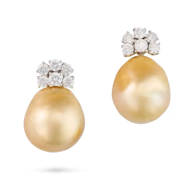 A PAIR OF GOLDEN PEARL AND DIAMOND DROP EARRINGS in 18ct white gold, each comprising a cluster of