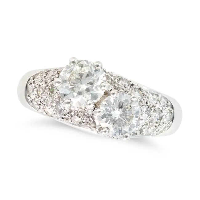 A DIAMOND DRESS RING in 18ct white gold and platinum, set with two principal round brilliant cut