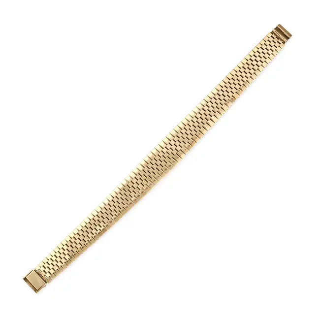 A GOLD BRACELET in 9ct yellow gold, the tapering strap bracelet comprising fancy links, full British