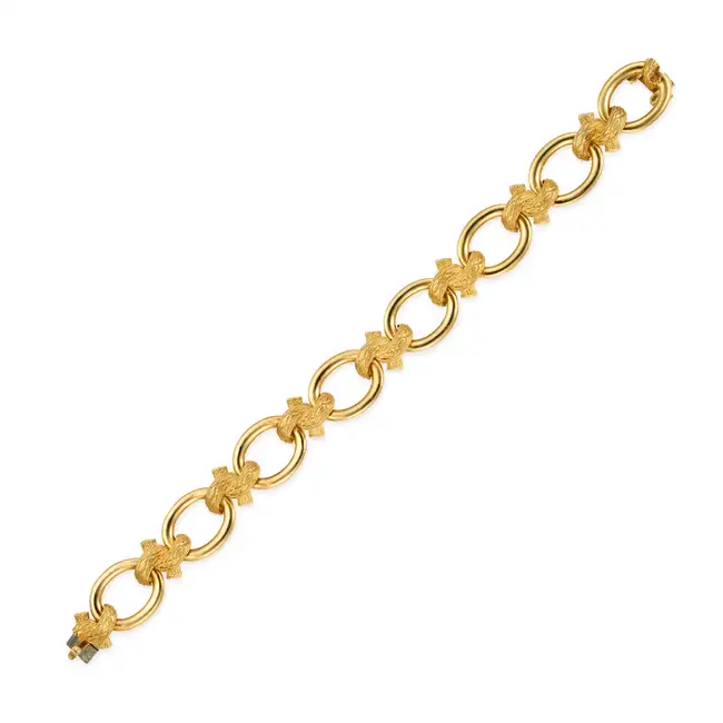 MELLERIO, A GOLD NECKLACE AND BRACELET SUITE in 18ct yellow gold, the necklace comprising a row of