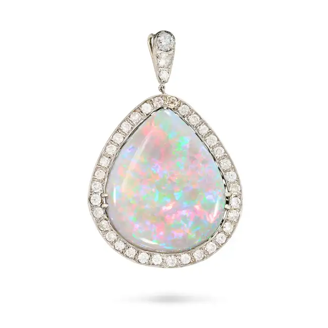 A FINE OPAL AND DIAMOND PENDANT set with a pear-shaped cabochon opal of approximately 21.70 carats
