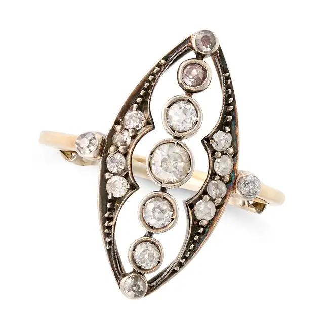 AN ANTIQUE DIAMOND NAVETTE RING in 14ct yellow gold and silver, the openwork navette face set with