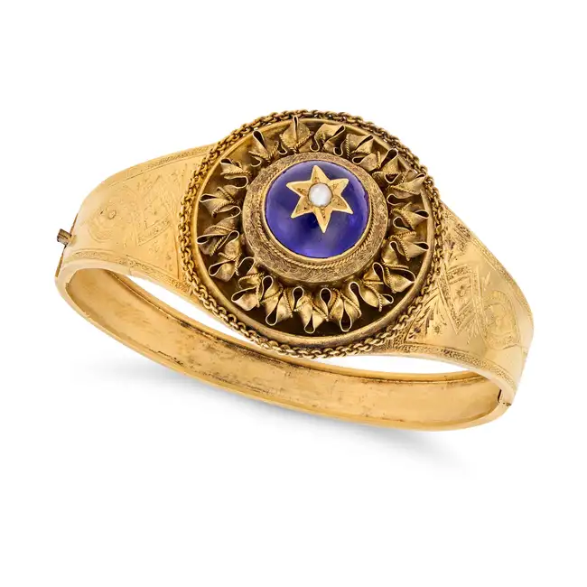 AN ANTIQUE ETRUSCAN REVIVAL PEARL AND ENAMEL BANGLE in yellow gold, the hinged bangle with a dome of