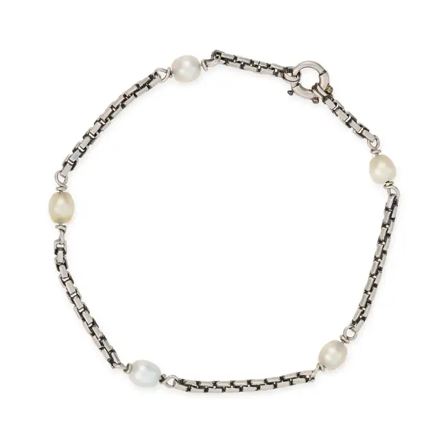 A PEARL BRACELET the chain accented by five pearls, no assay marks, 17.5cm, 6.6g.