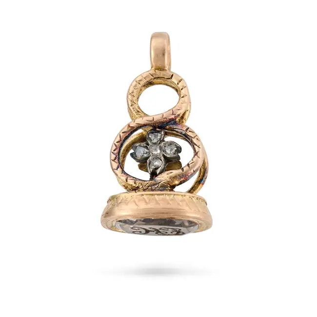AN ANTIQUE ROCK CRYSTAL AND DIAMOND OUROBOROS FOB SEAL / PENDANT, 19TH CENTURY designed as a snake